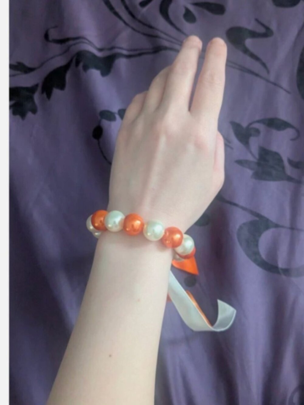 Orange and White Bead Bracelet with Ribbons